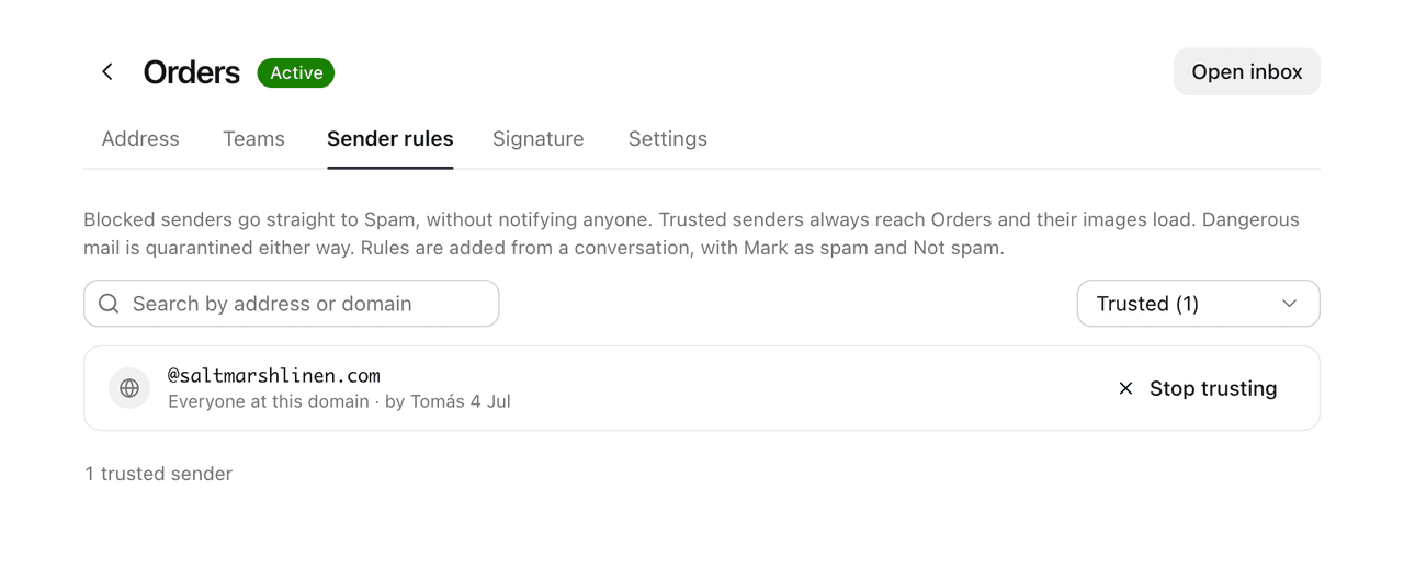 The Sender rules tab of an inbox, showing its trusted senders: a whole domain, who added it and when, and Stop trusting.